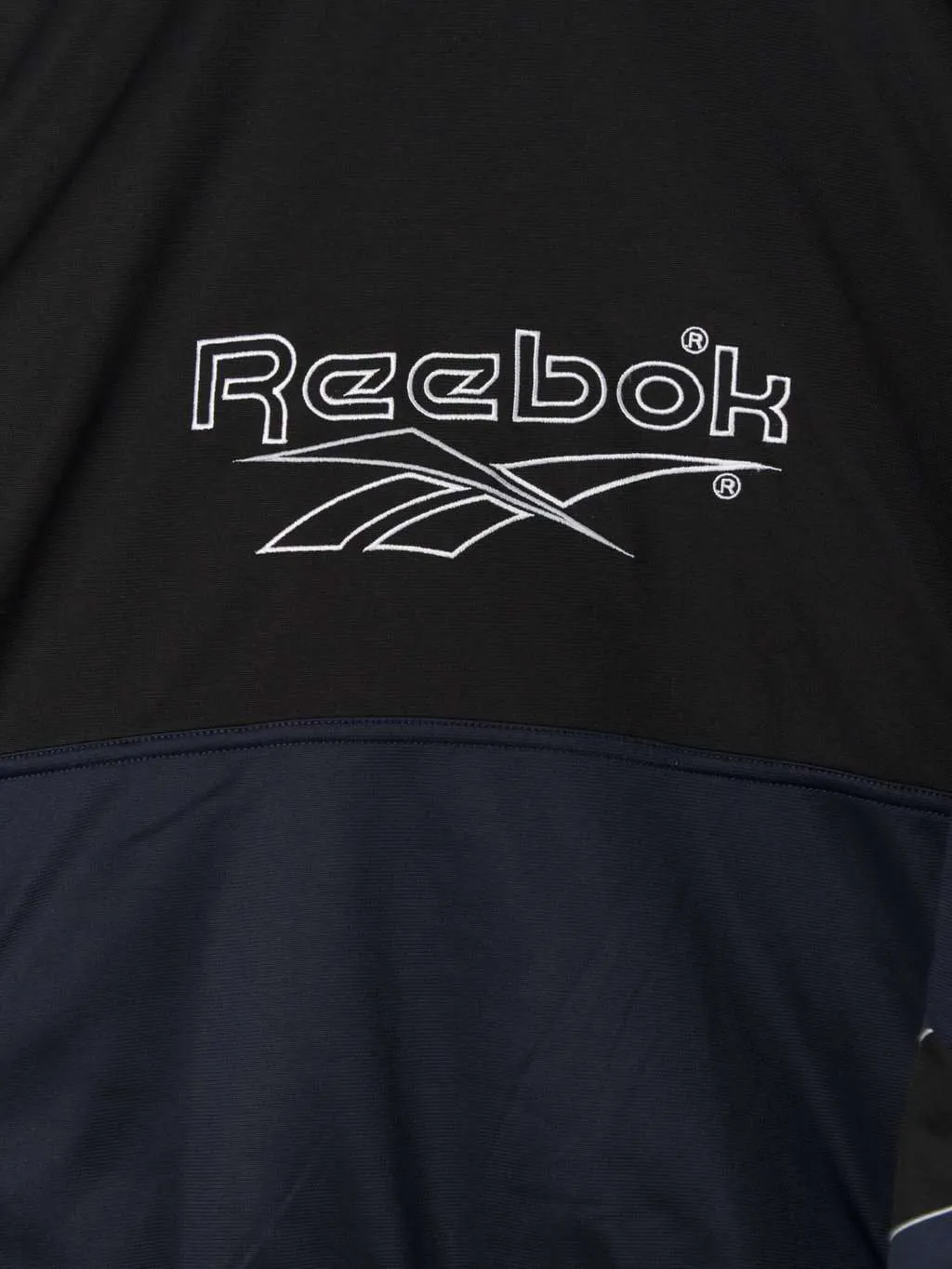 Vintage Reebok track jacket 90s spell out striped sleeves black and navy retro sports jacket – XL